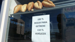Bozuk para sıkıntısı yaşayan esnaftan ilginç çözüm!